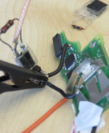 Opened car key with a probe clip